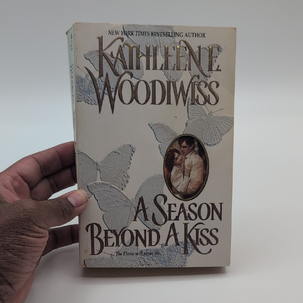 A Season Beyond a Kiss by Kathleen E. Woodiwiss